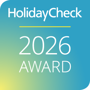 HolidayCheck 2026 Award Logo auf Farbverlauf